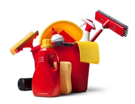 Vacuuming and dusting a London flat during end of tenancy cleaning
